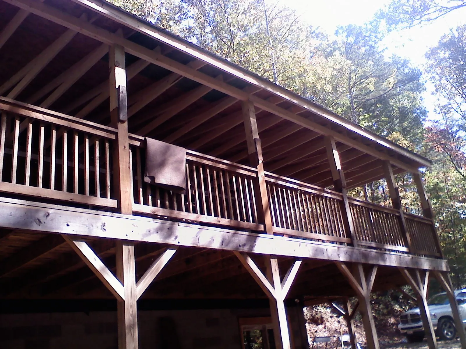Timber framing under a new elevated porch and deck — Roof Leak Repair in Newcomb by Roofing Brothers